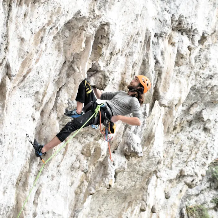 Two climbers ascending a crag